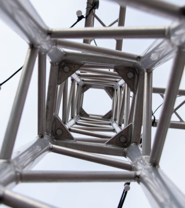 view through a metal support of pipes